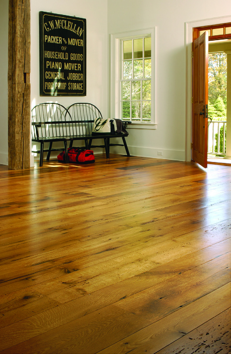 Before selecting reclaimed wood, such as the American oak flooring pictured here, be sure to factor in the relative humidity of your home. Wide board flooring may expand and contract seasonally.